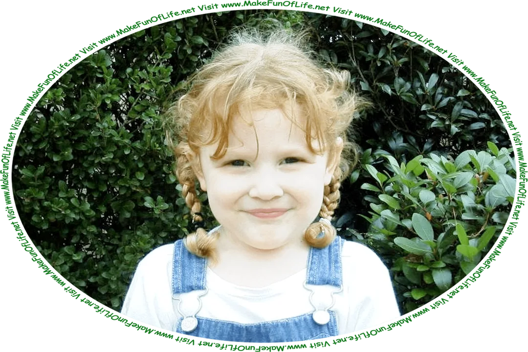 Picture of a happy smiling girl standing outside, with green leafy shrubs in the background, and the words, ‘Visit www.MakeFunOfLife.net.’