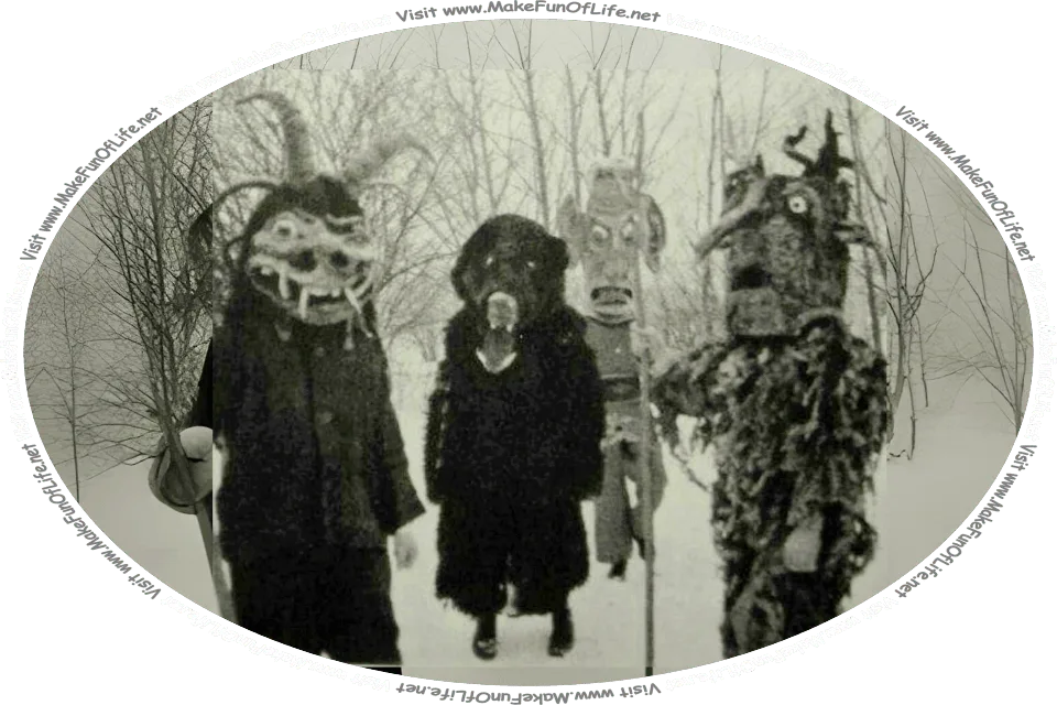 Picture of a four people in scary monster costumes standing in a woods in the winter, the trees bare of leaves, snow on the ground and falling snow, and the words, ‘Visit www.MakeFunOfLife.net.’
