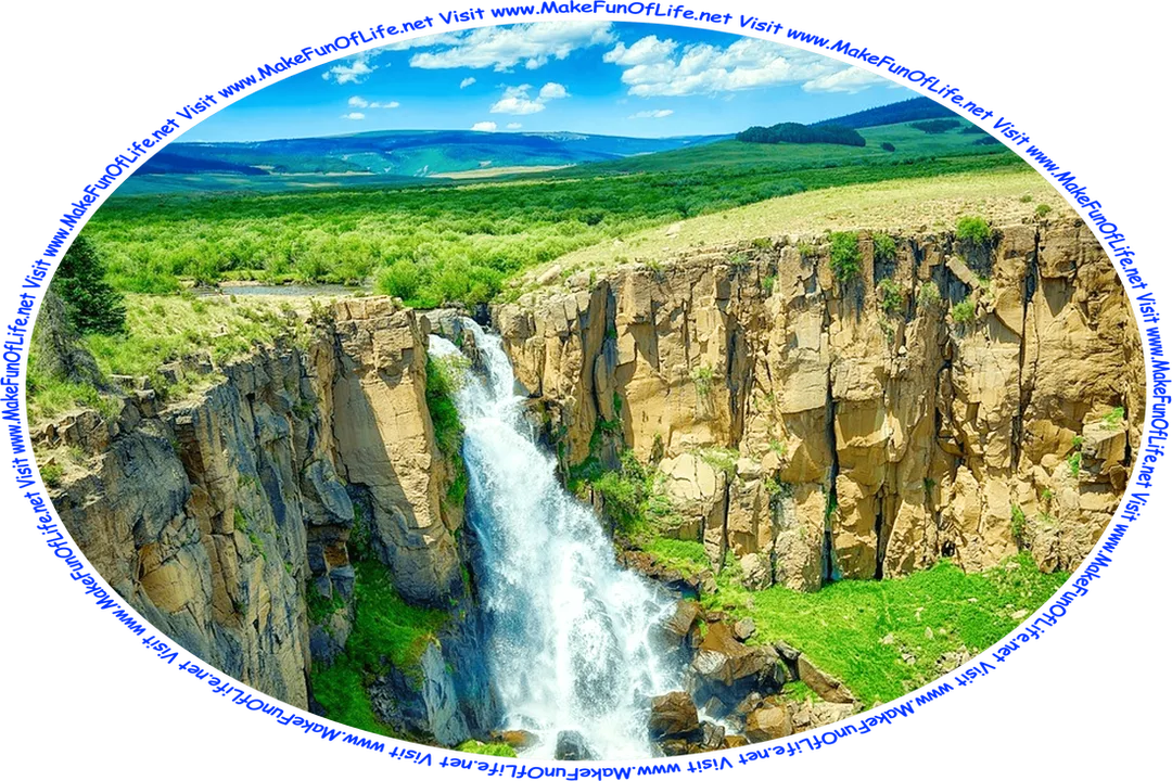Picture of a waterfall going down over bare rocks with green grass and green bushes going into the distance at the top of the waterfall, meeting the blue sky with fluffy white clouds, and the words, ‘Visit www.MakeFunOfLife.net.’