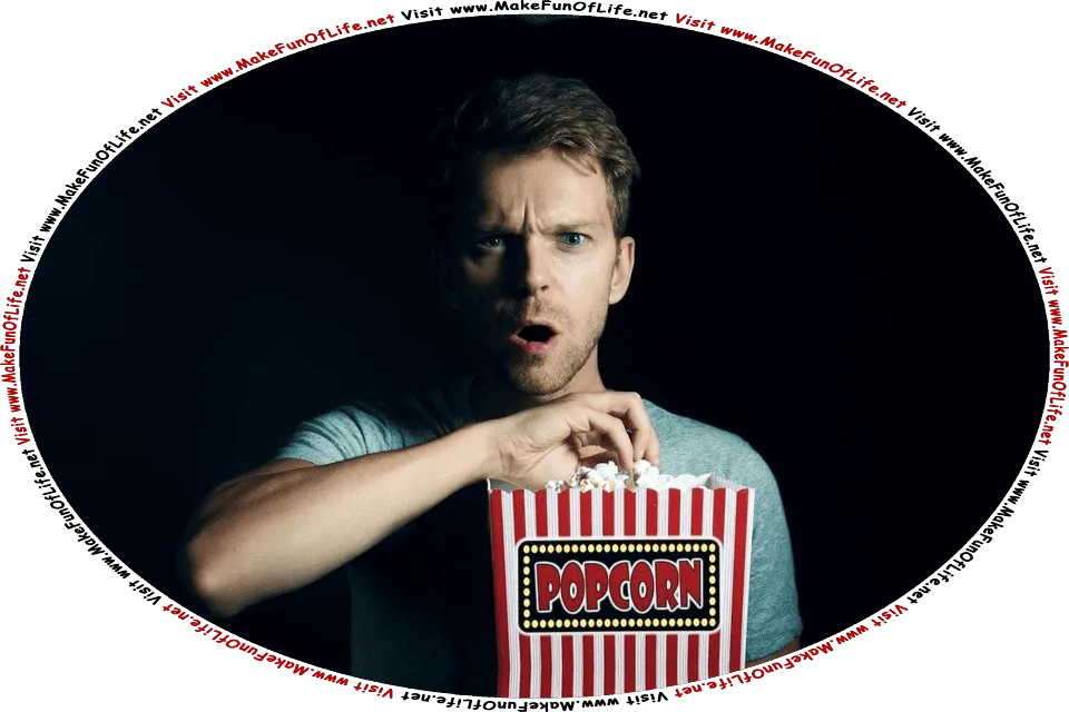 Picture of a man in the dark holding a large box of movie theater popcorn, with an expression of shock and disbelief on his face, and the words, Visit www.MakeFunOfLife.net.