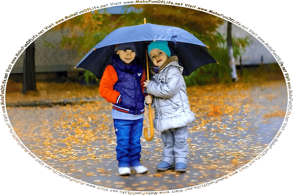 Photograph of a boy and a girl standing under an umbrella on a rainy Autumn day, with the leaves on the trees changing color, then falling to the ground, and the words, Visit www.MakeFunOfLife.net.