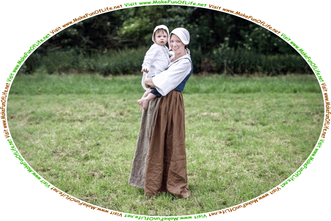 Picture of a happy smiling woman standing in a grassy field, while holding an infant child, and the words, Visit www.MakeFunOfLife.net.
