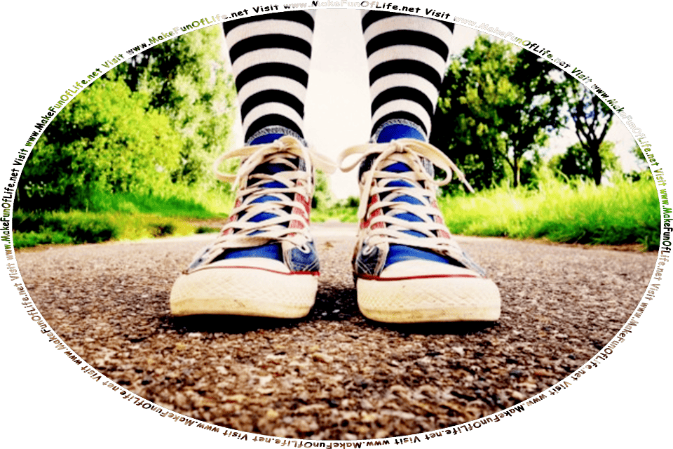 Picture of a person walking on an asphalt-paved path, with green grass and green leafy trees on each side of it, and the words, Visit www.MakeFunOfLife.net.