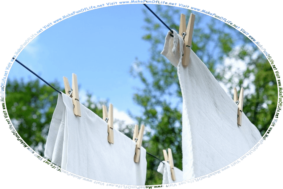 Picture of drying linens fastened to a clothesline with wooden clothespins, with the branches of green leafy trees in the background, a blue sky with fluffy white clouds above, and the words, Visit www.MakeFunOfLife.net.