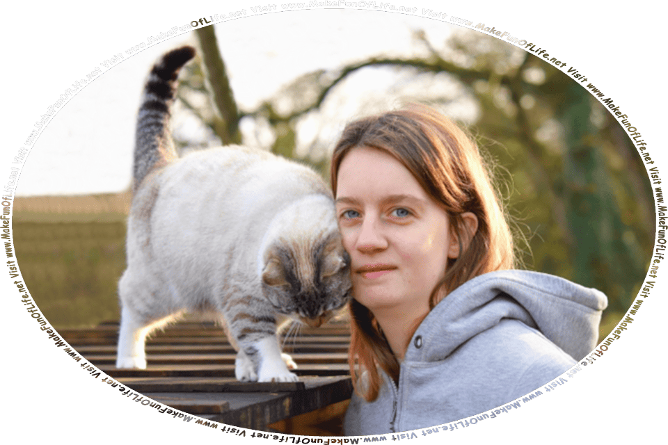 Picture of a domestic cat nuzzling a young woman’s face, and the words, Visit www.MakeFunOfLife.net.