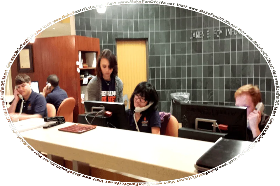 Picture of students and staff of the James E. Foy Information Desk at Auburn University, and the words, Visit www.MakeFunOfLife.net.