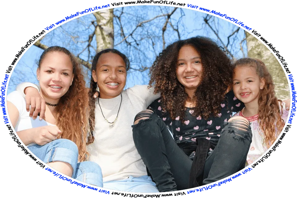 Picture of a four happy smiling girls sitting under trees, with a blue sky overhead, and the words, ‘Visit www.MakeFunOfLife.net.’
