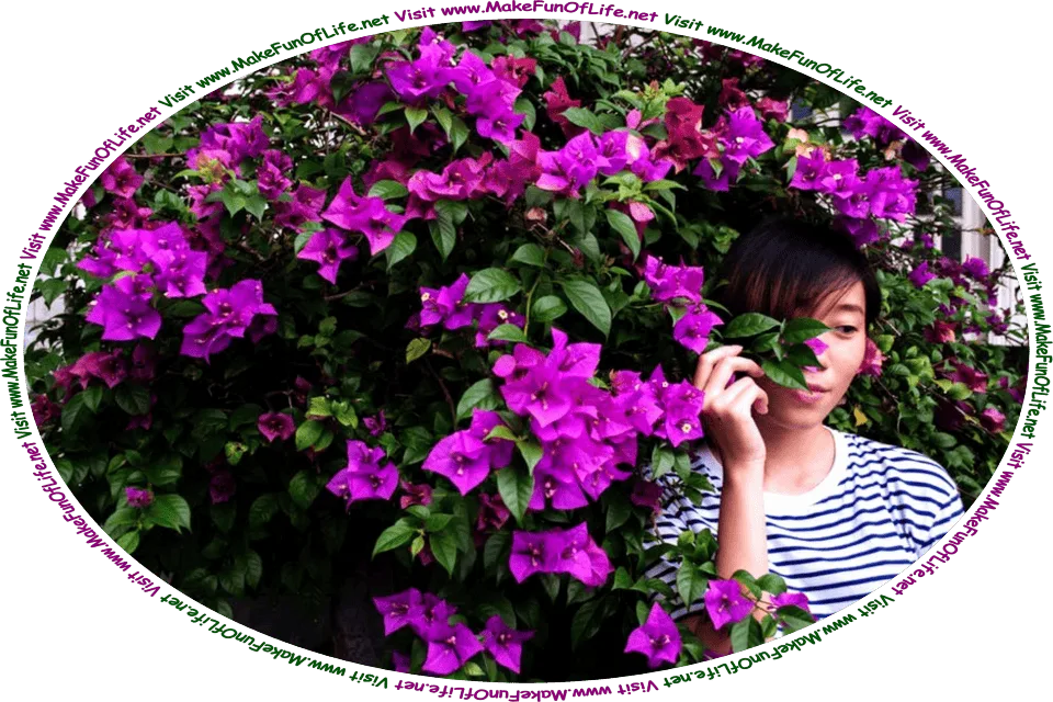Picture of a woman partially hiding behind a flowering bush, and the words, ‘Visit www.MakeFunOfLife.net.’