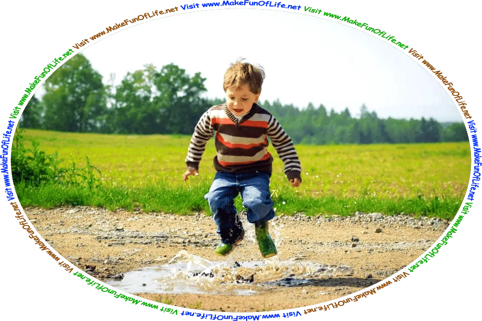Picture of a happy young boy jumping into a water puddle in a dirt road next to a green grassy field with green leafy trees in the distance, an overcast sky above, and the words, ‘Visit www.MakeFunOfLife.net.’