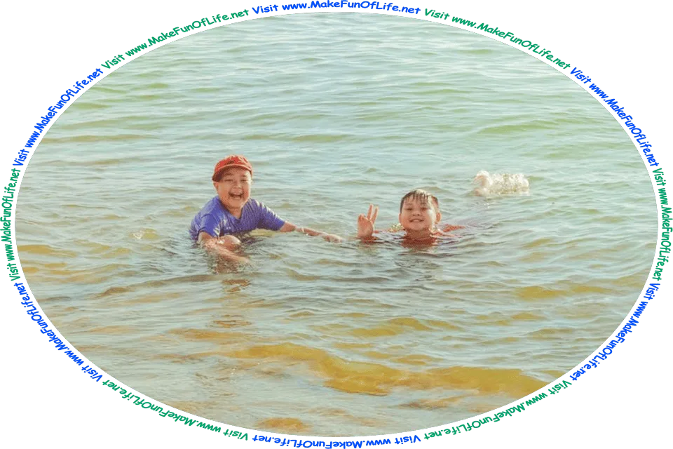 Picture of two happy smiling boys swimming in water, and the words, ‘Visit www.MakeFunOfLife.net.’