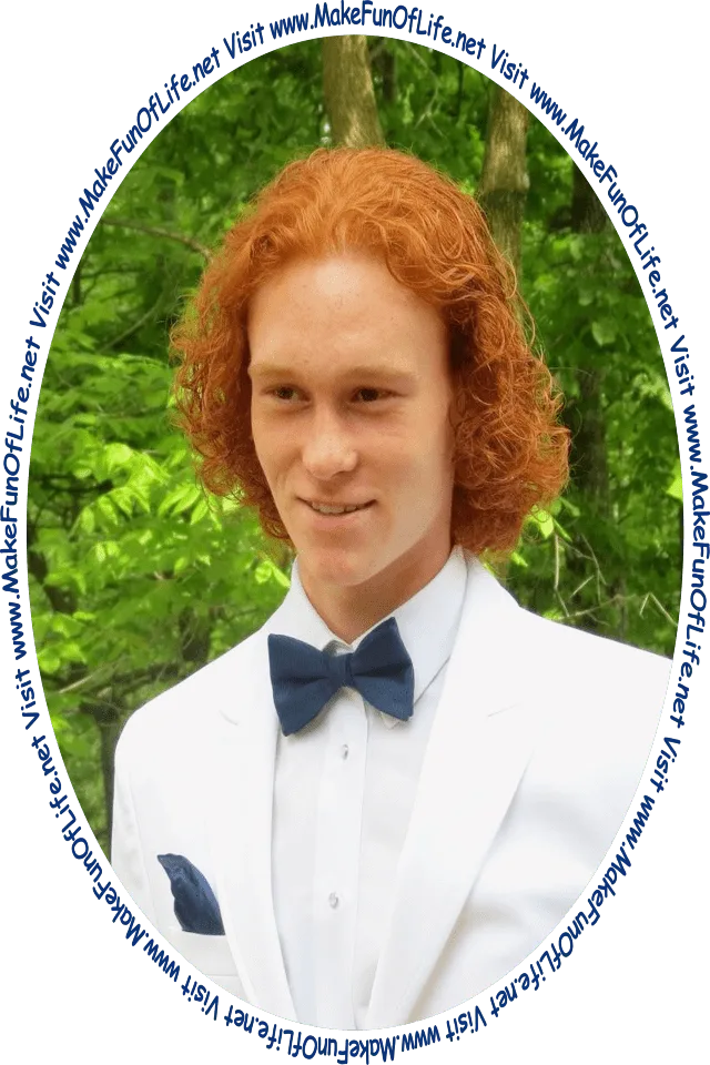 Picture of a happy smiling young man in a white tuxedo standing outside with green leafy trees in the background, and the words, ‘Visit www.MakeFunOfLife.net.’