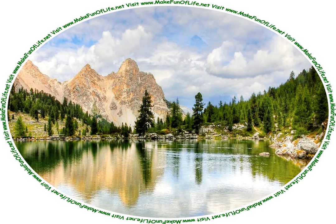 Picture of a mountain lake surrounded by evergreen trees, with a blue sky and fluffy white clouds above, and the words, ‘Visit www.MakeFunOfLife.net.’